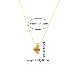 Minimalist stainless steel seahorse pendant necklace with textured gold finish