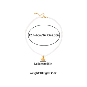White pearl necklace with gold octopus pendant showing length 42.5cm and 10g weight detail