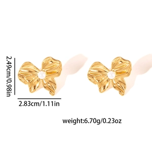 Detailed view of gold irregular petal earrings with pearl center including size dimensions