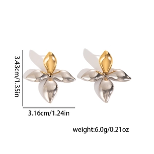 Detail view of gold and silver flower earrings showing size 3.43cm height and 3.16cm width
