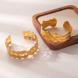 Gold plated ginkgo leaf open cuff bracelet with minimalist leaf texture design