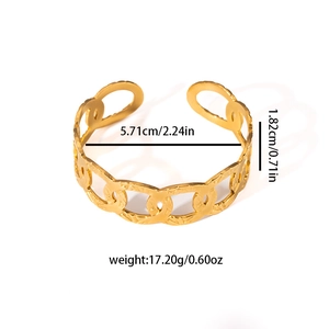 Detail view of gold-plated bangle with inner diameter 5.71cm and width 1.82cm measurements