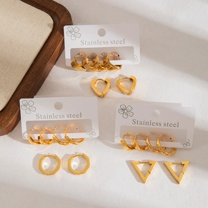 Elegant gold-plated geometric stainless steel earrings set displayed on white card