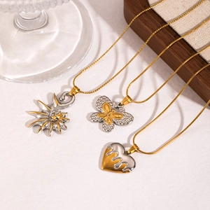 Three minimalist stainless steel necklaces with sun, butterfly, and heart pendants