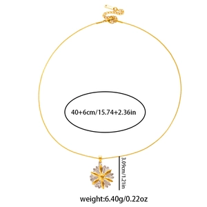 Detail view of gold daisy necklace with dimensions showing 40cm chain and 3.09cm pendant