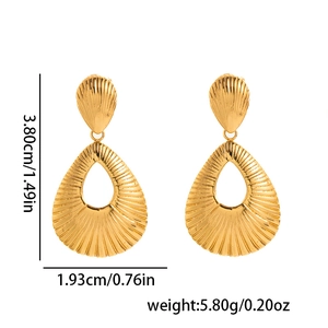 Golden titanium steel oval drop earrings with hollow ginkgo leaf pattern and dimensions