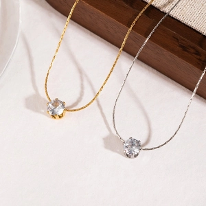 Minimalist gold and silver stainless steel necklace set with sparkling round zircon pendants