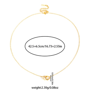 Detail of gold double heart necklace showing lobster clasp and extension chain with measurements