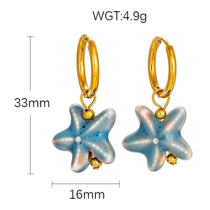 Detailed view of ocean style ceramic starfish earrings with size and weight specs
