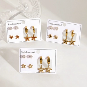 Set de 3 paires de boucles d'oreilles en acier doré avec étoiles de mer et zircon
