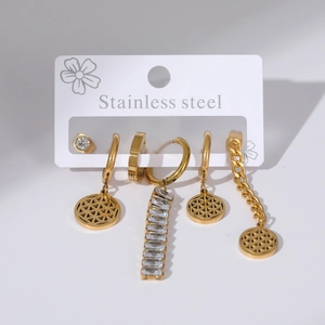 Detail view of 5-piece gold stainless steel earring set with cubic zirconia accents
