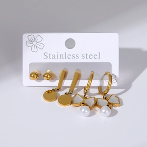 Three-piece stainless steel earring set featuring gold studs, pendants, and pearl bows