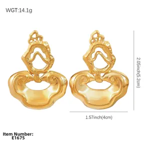 Vintage irregular golden stainless steel earrings with fluid organic sculptural design