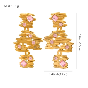Irregular gold layered earrings with pink crystals for a luxury geometric style look