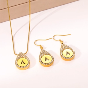 Elegant gold titanium steel jewelry set featuring water drop pendants with letter A