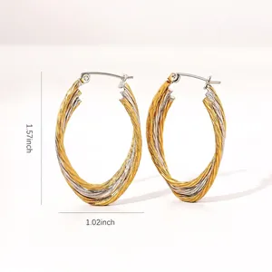 Détail de boucles d'oreilles créoles ovales torsadées bicolores avec dimensions