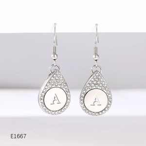 Silver teardrop earrings with halo crystals and letter A engraving for women