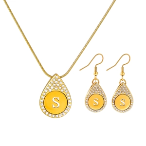 Elegant gold titanium steel jewelry set featuring water drop necklace and letter S earrings