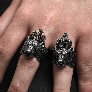 Macro shot showing detailed lion head ring with crown in silver and gold vintage finish