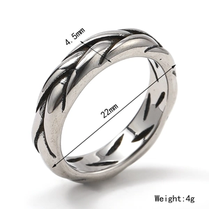 Polished stainless steel braided ring for men featuring detailed woven wheat texture