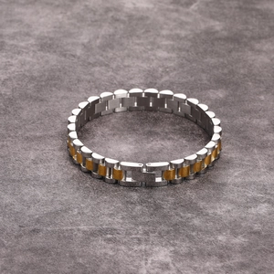 Two-tone silver and gold stainless steel watch-link bracelet with a brushed metal finish