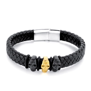 Punk Herren Lederarmband geflochten mit schwarzen und goldenen Totenköpfen und Magnetverschluss
