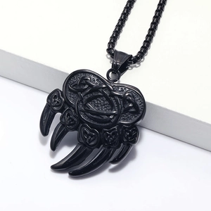 Nordic viking bear claw pendant necklace in matte black steel with celtic knot patterns