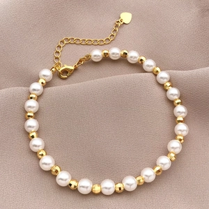 Bracciale in perle placcato oro 18 carati con motivo a diamante e ciondolo a cuore