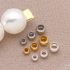 18K gold plated and silver spacer beads on fabric with pearls for DIY jewelry making