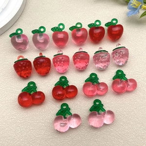 Translucent resin fruit pendants in strawberry and cherry shapes for DIY jewelry making