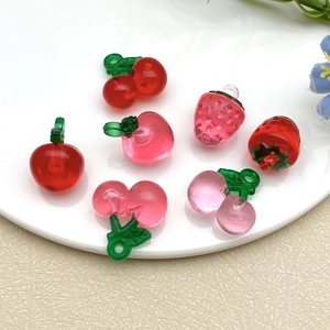 Transparent resin fruit pendants of cherry, strawberry, and apple for DIY jewelry making