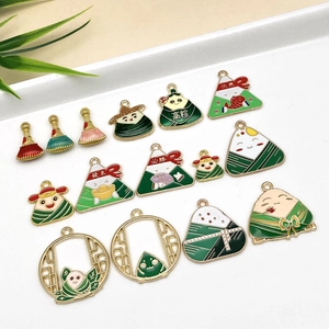 Detail of cartoon rice dumpling pendants and charms for DIY bracelets in enamel alloy