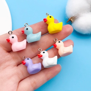 Colorful resin duck charms in six pastel shades with silver rings for DIY jewelry making