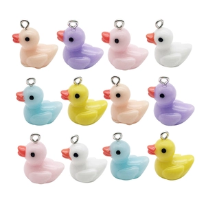 Set of 12 colorful resin duck pendants in pastel tones for DIY jewelry making