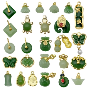 Chinese style green glass pendants with golden metal frames in various auspicious shapes