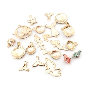 Gouden oceaan bedeltjes set met zeesterren en schelpen voor DIY-sieraden maken