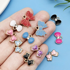 Colgantes de lazo esmaltados de colores con diamantes para bisutería artesanal