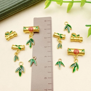Bamboo and leaf pendants with green enamel and Fu character for DIY jewelry making