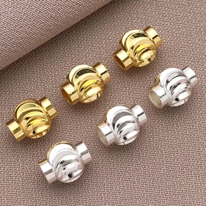 Detailed macro view of 18k gold and silver plated lantern spacer beads for DIY jewelry making