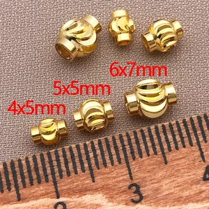 Detail of 18k gold-plated lantern beads in 4x5mm, 5x5mm, and 6x7mm sizes for DIY jewelry