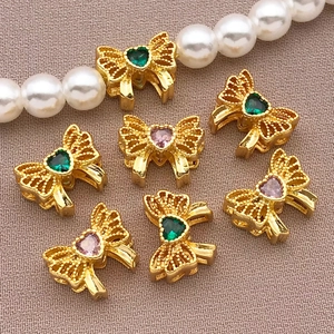 18K gold-plated bow-shaped charm spacers with cubic zirconia for DIY jewelry making
