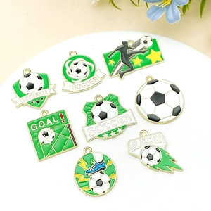 Detail view of colorful enamel soccer goal pendants and football charms for DIY jewelry making