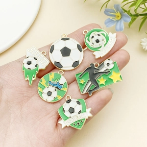 Detail view of 6 enamel soccer charms for DIY jewelry and football keychains