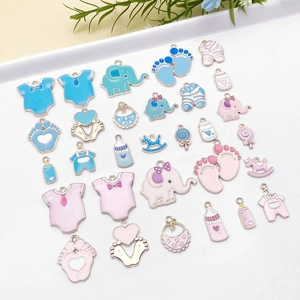 Set de 30 dijes de bebé en aleación esmaltada azul y rosa para creación de bisutería