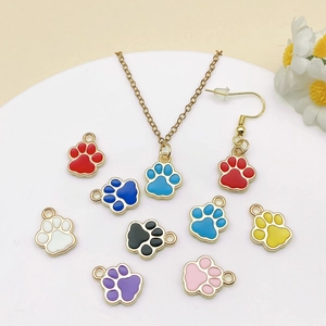 DIY colorful enamel paw print charms for necklaces and earrings in eight bright shades