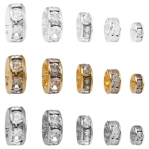 Cuentas espaciadoras rondelle chapadas en oro de 18k con cristales plata oro y negro