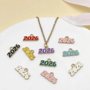 Detailed view of colorful 2026 enamel number pendants with golden alloy finish and chain