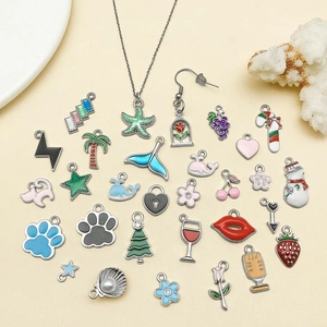 Assorted enamel alloy pendants including starfish, palm trees and fruit for DIY jewelry
