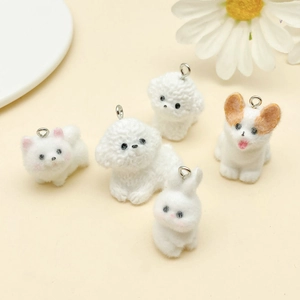 Flocked animal charms featuring rabbit, corgi, and teddy dog designs for DIY keychains
