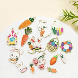 Detail showing various Easter charms including rabbits and carrots on a display plate